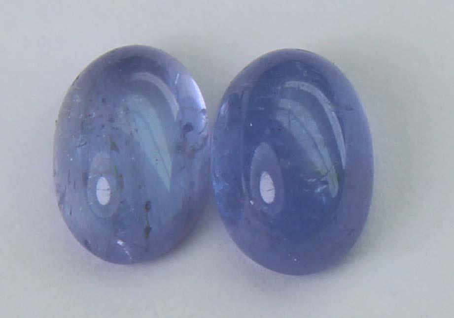1.98 cts Natural Tanzanite: No Reserve! Title: 1.98 cts Natural Tanzanite Additional Information: Gemstone : Natural Tanzanite Shape and cut : Oval cabochan Weight : 1.98 Carats Measurements : 6.94x4.84x3.39 mm , 6.80x4.66x2.90 