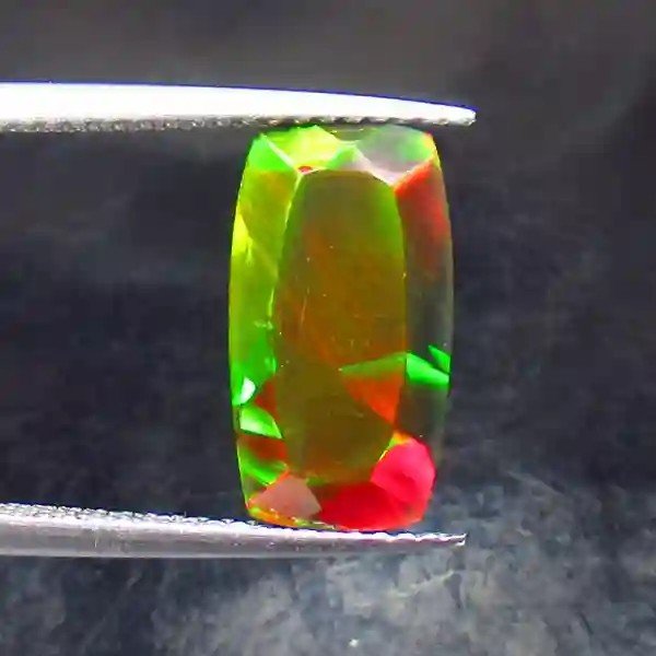 2.62 Ctw Natural Ethiopian Black Fire Opal Cushion Cut: No Reserve! Title: 2.62 Ctw Natural Ethiopian Black Fire Opal Cushion Cut Stone Clarity: Translucent Gemstones: Black Opal Carat Weights: 2.62 Size/Dimensions: 13.80 x 7.50 x 5.40 mm Additional Inform