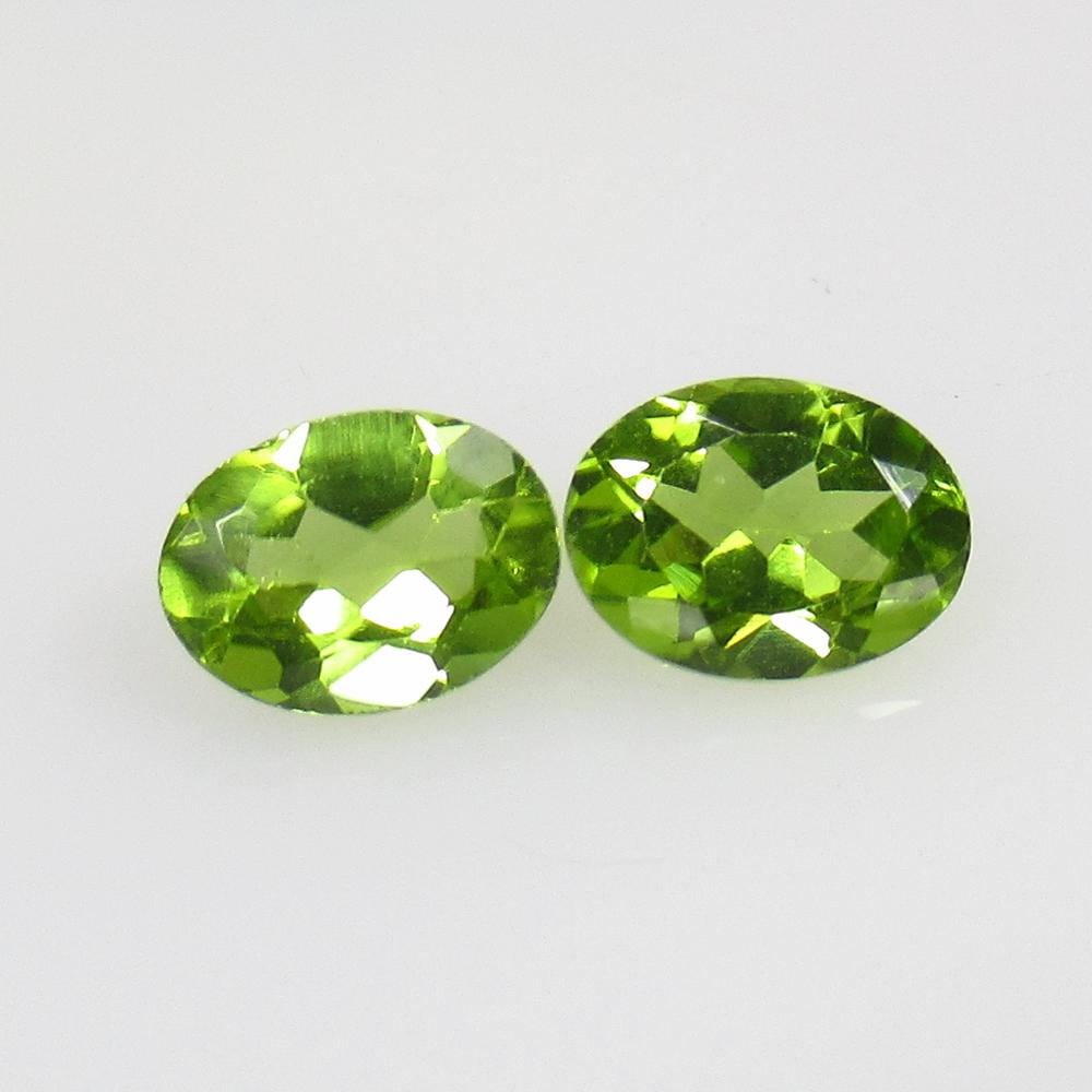 2.50 Ctw Natural Pakistan Peridot Oval Pair: No Reserve! Title: 2.50 Ctw Natural Pakistan Peridot Oval Pair Stone Clarity: VVS Gemstones: Peridot Carat Weights: 2.5 Size/Dimensions: 7.90 x 6.10 x 3.80 mm / 2 Pc's Additional Information: Top Clas