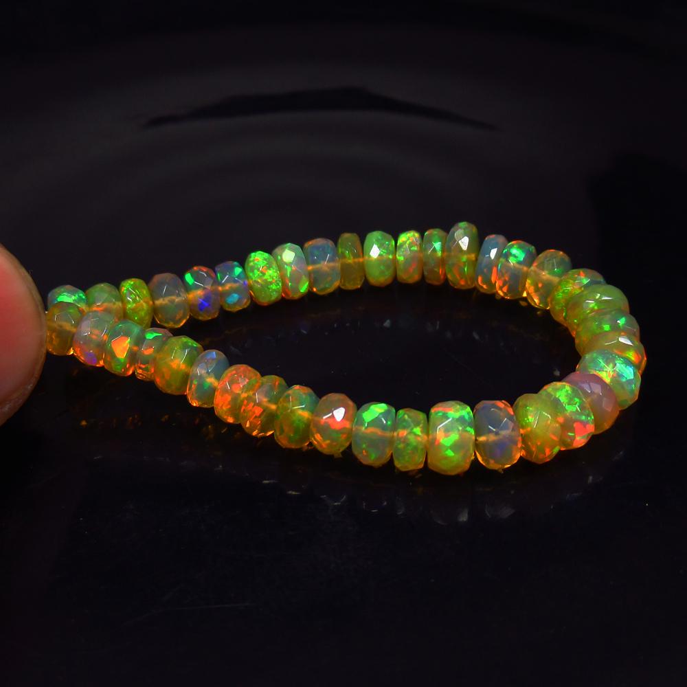 15.97 Ctw Natural 39 Ethiopian Drilled Faceted Fire: No Reserve! Title: 15.97 Ctw Natural 39 Ethiopian Drilled Faceted Fire Opal Beads Stone Clarity: Transparent Gemstones: Faceted Fire Opal Beads Carat Weights: 15.97 Size/Dimensions: 4.30 to 5.50 mm / 