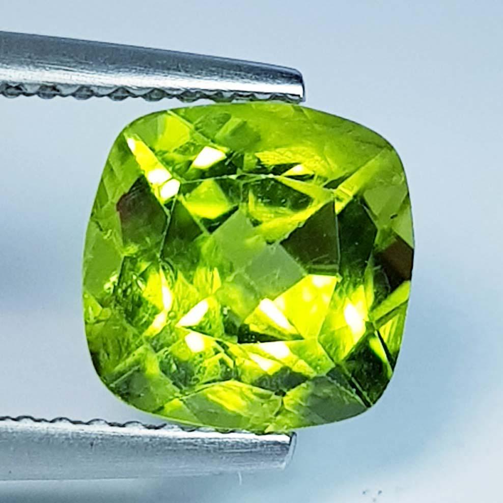 2.43 Ct Natural Peridot Cushion Cut: No Reserve! Title: 2.43 Ct Natural Peridot Cushion Cut Color/Clarity: IF - VVS Carat Weight: 2.43 Size/Dimensions: 8.00 x 8.00 x 5.60 Additional Information: Cushion / Pakistan Shipping: Domestic: Fl