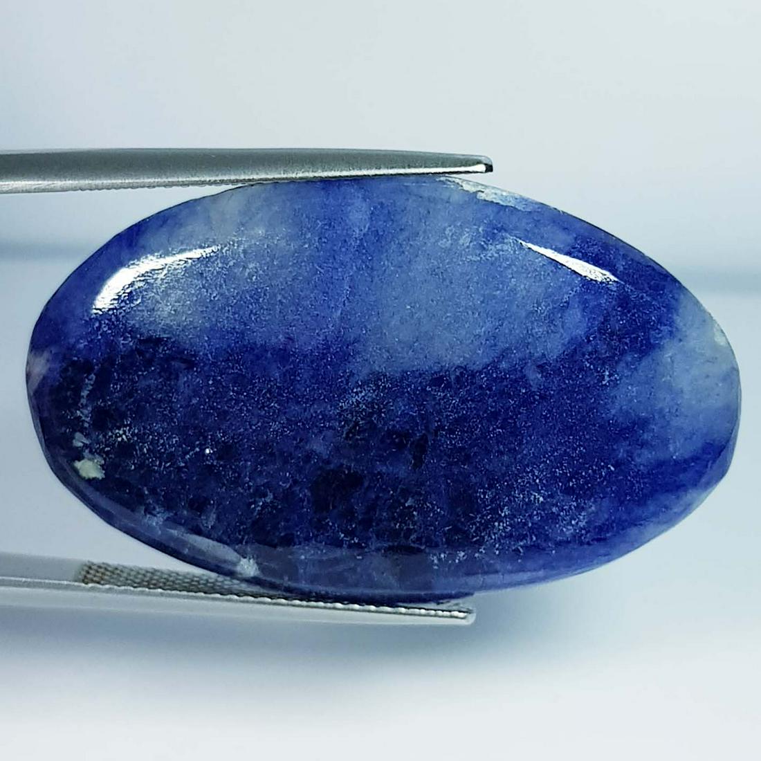 34.36 ct Natural Sodalite: No Reserve! Title: 34.36 ct Natural Sodalite Color/Clarity: Opaque Carat Weight: 34.36 Size/Dimensions: 37.90 x 23.45 x 5.00 Additional Information: Oval - Brazil Shipping: Domestic: Flat-rate of $7