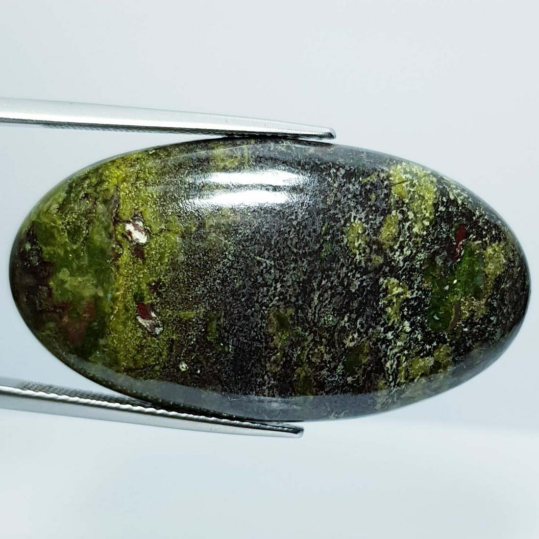 52.29 Ct Natural Dragon Jasper: No Reserve! Title: 52.29 Ct Natural Dragon Jasper Color/Clarity: Opaque Carat Weight: 52.29 Size/Dimensions: 39.85 x 21.85 x 6.10 Additional Information: Oval - Africa Shipping: Domestic: Flat-rate o