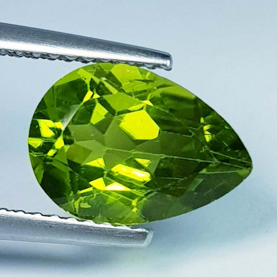 3.19 Ct Natural Peridot Pear Cut: No Reserve! Title: 3.19 Ct Natural Peridot Pear Cut Color/Clarity: IF - VVS Carat Weight: 3.19 Size/Dimensions: 11.20 x 8.00 x 5.20 Additional Information: Pear / Pakistan Shipping: Domestic: Flat-ra