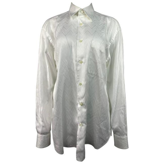Brioni Neiman Marcus White Cotton Button Down Shirt: Product details: Featuring white cotton button down shirt with doted and striped zigzag geometric pattern, front left pocket and collar detail. Formal fit. Made in Italy. Details Designer Brioni Brand
