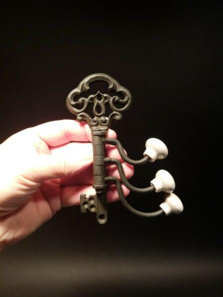 Cast Iron Key Swivel Hook W Porcelain Knobs (1 of 20)