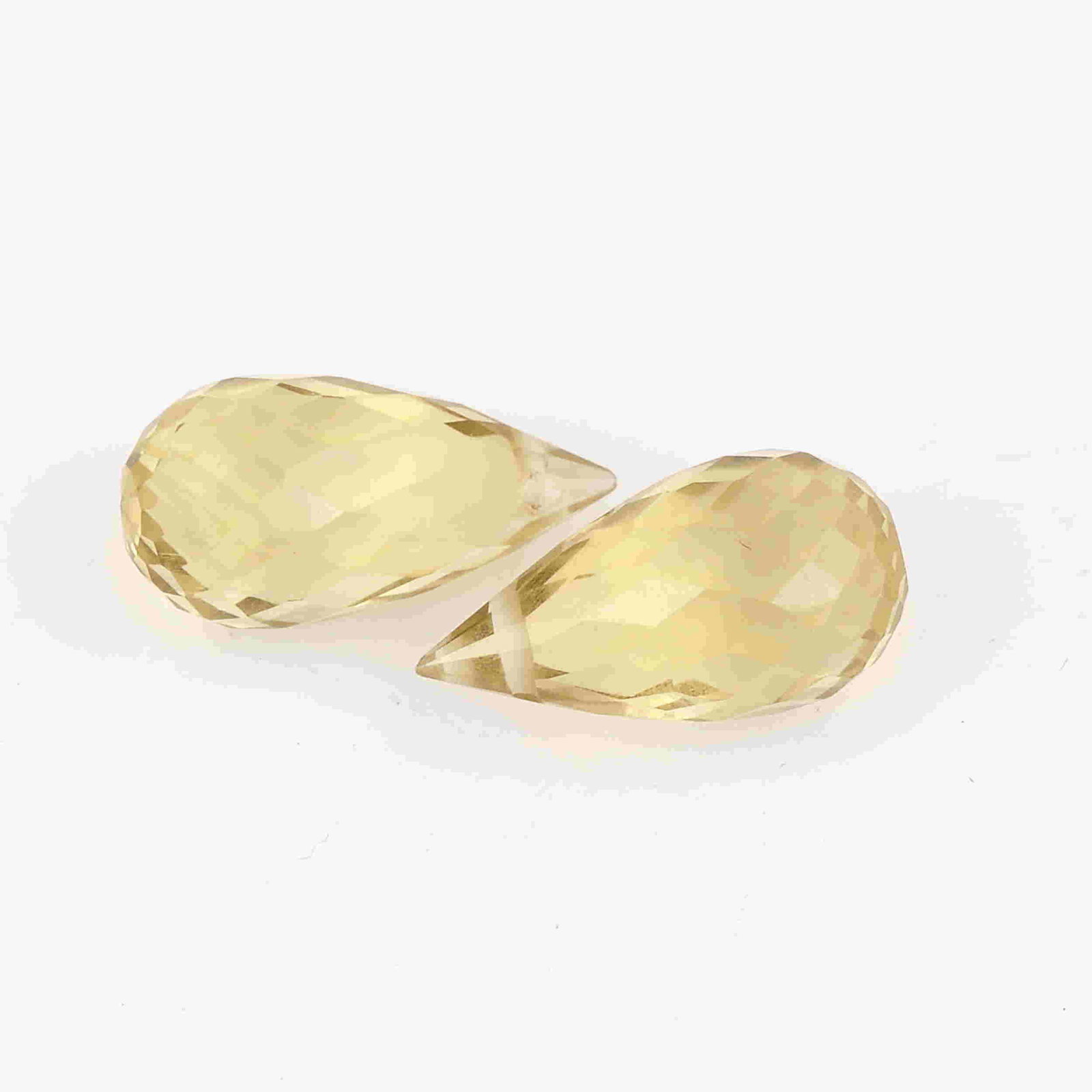 4.95 Carat Yellow Color Natural Drops Lemon Quartz: No Reserve! Title: 4.95 Carat Yellow Color Natural Drops Lemon Quartz Loose Gemstone 2 Pieces Brand: Gems Trading Center Gemstones: Lemon Quartz Carat Weights: 4.95 Size/Dimensions: 6H x 12L x 6W mm S