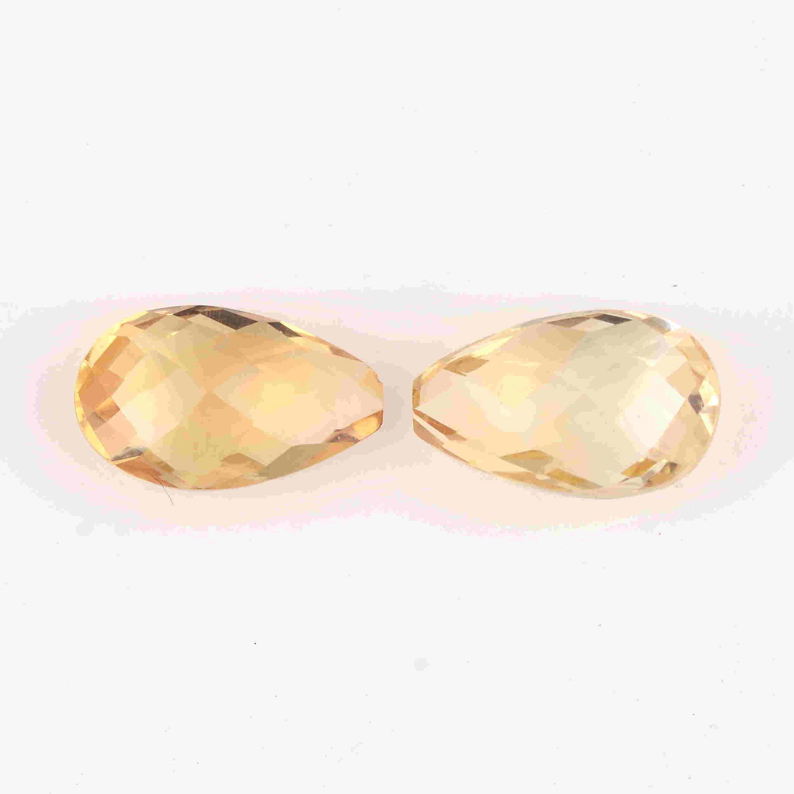 3.20 Carat Yellow Color Natural Pear Lemon Quartz Loose: No Reserve! Title: 3.20 Carat Yellow Color Natural Pear Lemon Quartz Loose Gemstone 2 Pieces Brand: Gems Trading Center Gemstones: Lemon Quartz Carat Weights: 3.2 Size/Dimensions: 4.5H x 10L x 6W mm S