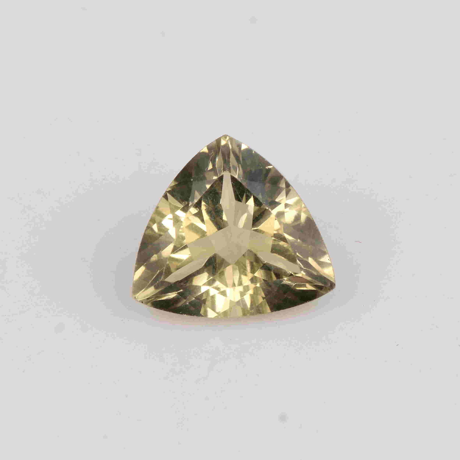 6.85 Carat Yellow Color Natural Trillion Lemon Quartz: No Reserve! Title: 6.85 Carat Yellow Color Natural Trillion Lemon Quartz Loose Gemstone 1 Pieces Brand: Gems Trading Center Gemstones: Lemon Quartz Carat Weights: 6.85 Size/Dimensions: 8H x 14L x 14W 