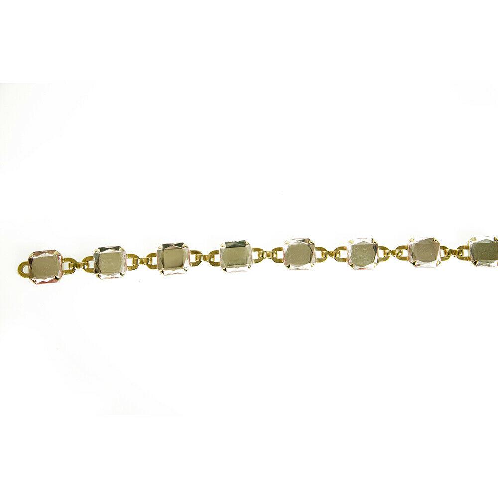 Escada Exotics Large Clear Beads Single Strand Gold: Escada Exotics Large Clear Beads Single Strand Gold tone Chain Belt This gorgeous belt By Escada features a gold tone metal chain with large, impressive beads and has hook eye adjustable closure. Add