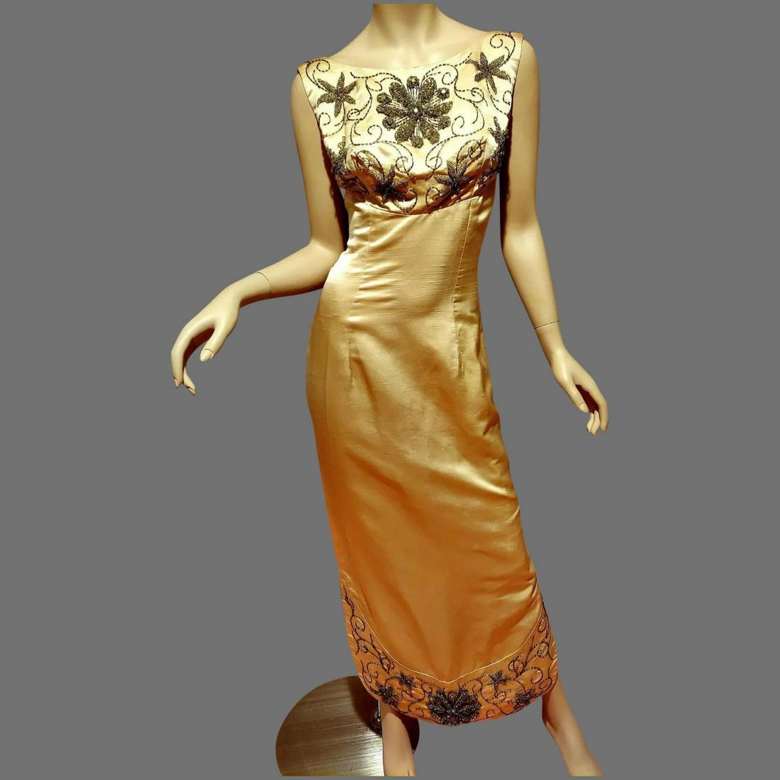 Vtg Silk Shantung maxi Hostess Gown Heavily Hand: A Magnificent Maxi hostess Gown Circa 1950's Hand beaded with Glass beads in a stunning design at bodice and very wide Bottom Hemline . Line by silk organza . High slits at sides metal back zipper. In