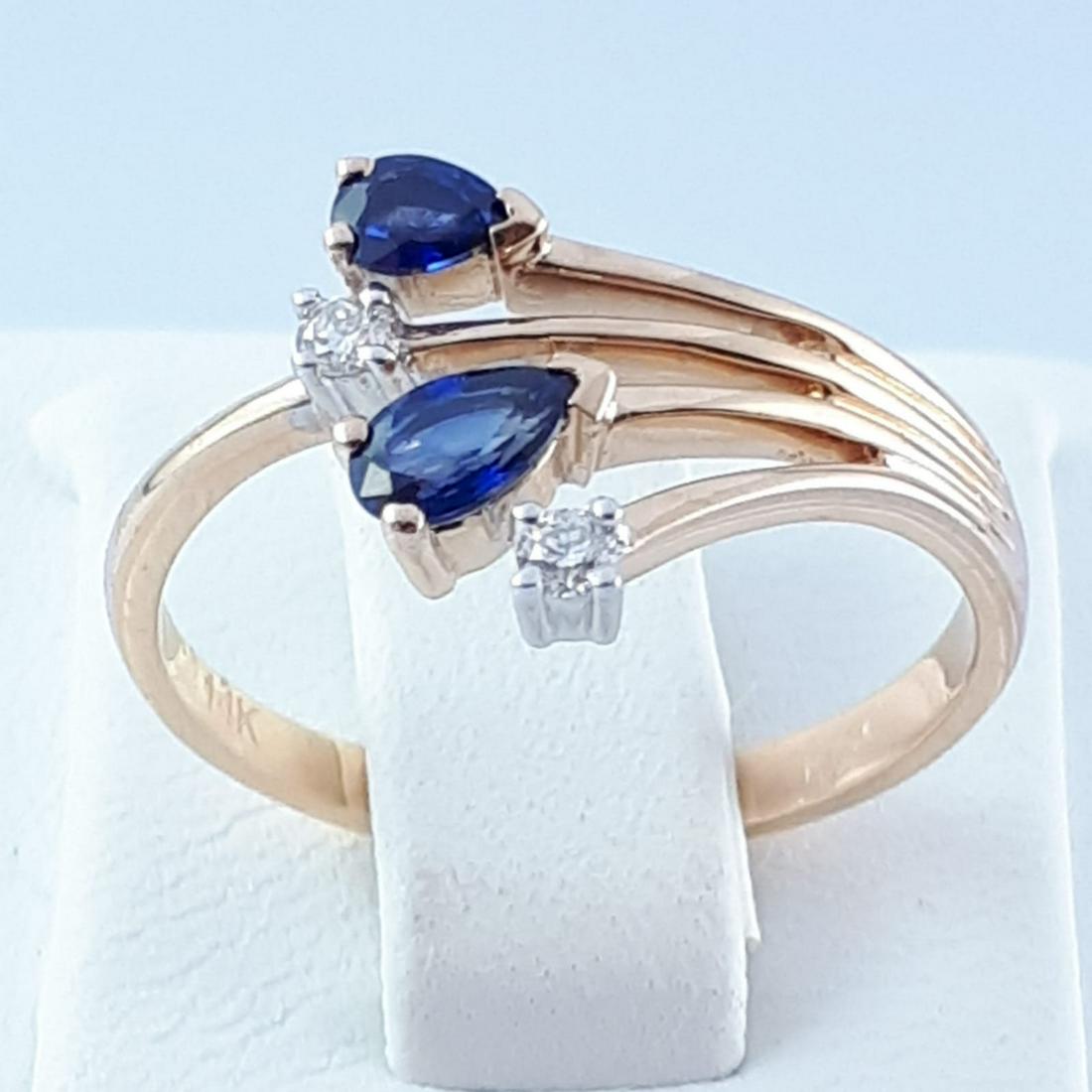 14K Pink and White Gold - Ring: Title: 14K Pink and White Gold - Ring Description: Ring Gender : Women Material : 14K Pink and White Gold Diamond : Total 0,07 ct / 2 pcs brillant cut I VS Saphire : 2 pcs Pear cut 0,37 ct Weight