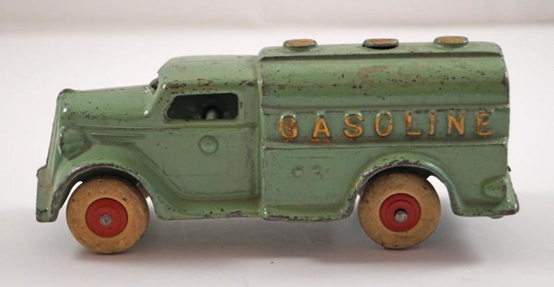 Antique Gasoline Truck Cast Iron Toy: Title: Antique Gasoline Truck Cast Iron Toy Date/Period: Circa 1930's. Dimensions: 2 3/4" tall x 6 7/8" long x 2 3/4" wide. Provenance/Additional Info: Offering for sale a cast iron Gasoline Tanker Tr