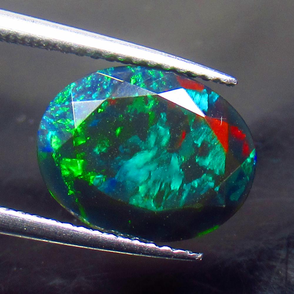 3.43 Ctw Natural Ethiopian Black Fire Opal Oval Cut (1 of 2)