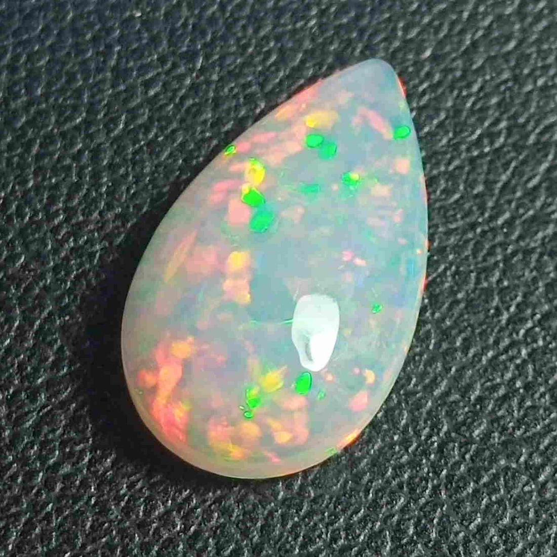 3.05 CTS EXTRAORDINARY LUSTER ! NATURAL ETHIOPIAN WELO: Title: 3.05 CTS EXTRAORDINARY LUSTER ! NATURAL ETHIOPIAN WELO OPAL PEAR SHAPE LOOSE GEMSTONES Carat Weights: 3.05 Size/Dimensions: 15.8 x 9.4 x 4.4 MM Additional Information: UNHEATED ETHIOPIAN Reserv