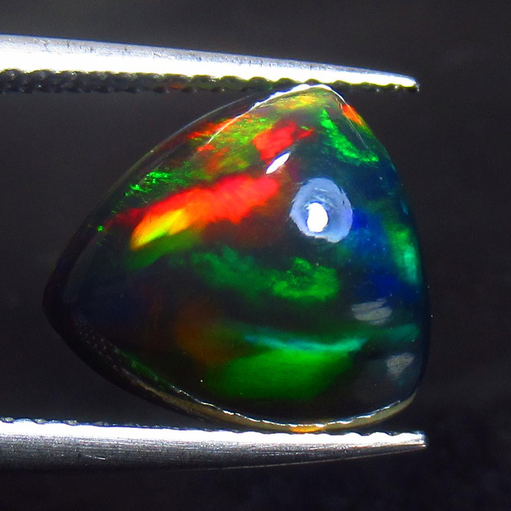 3.06 Ct Natural Black Fire Opal Trillion Cab (1 of 2)