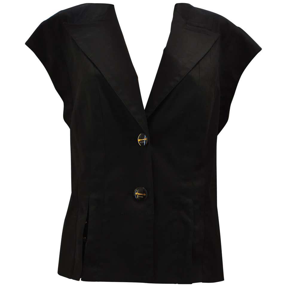 Escada Black Cotton Vest with Lace-Up Detail (44: Cap sleeves; two lovely front buttons; notched lapels, and two slits at the front with lace-up details (leather). Can be worn as is or over a sweater or blouse. The lining is a black and white animal