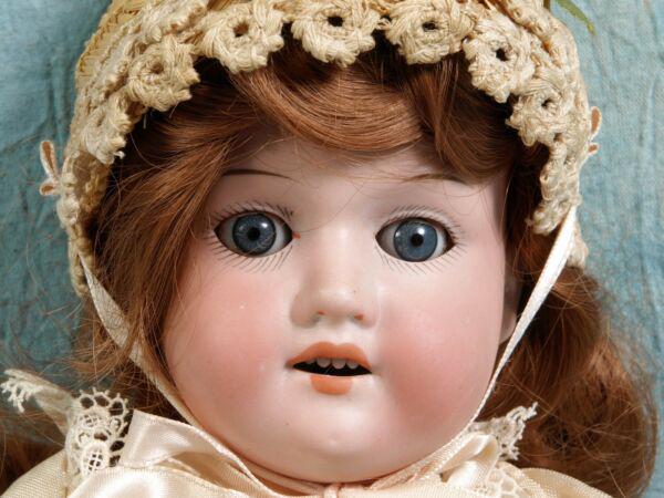 ARMAND MARSEILLE Doll SLEEPY EYES Bisque Head Antique: This is a beautiful 17" Antique Armand Marseille Bisque head and stuffed body doll, made in Germany. The head of the doll is bisque. She has a beautiful face with blue eyes that open and close. She ha