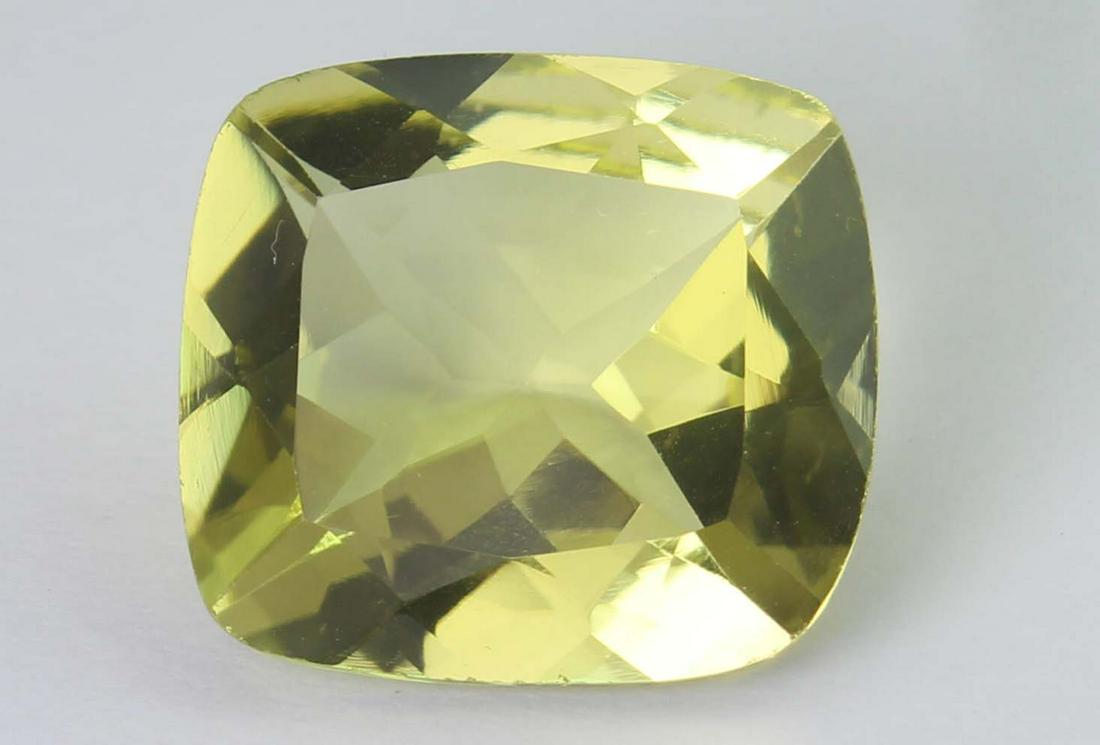 11.19 Ct Natural Lemon: No Reserve! Gemstone : Natural Lemon Origin: Brazil Weight : 11.19 carats Dimensions : 15.93x14.54x8.00 mm Shape/Cut : Retengular Cushan cut Colour : Yellow Transparency: transparent Clarity: VVS Trea