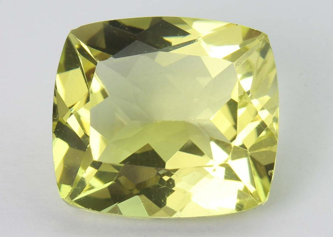 13.28 Ct Natural Lemon: No Reserve! Gemstone : Natural Lemon Origin: Brazil Weight : 13.28 carats Dimensions : 16.13x14.58x8.90 mm Shape/Cut : Retengular Cushan cut Colour: Yellow Transparency: transparent Clarity: VVS Treat