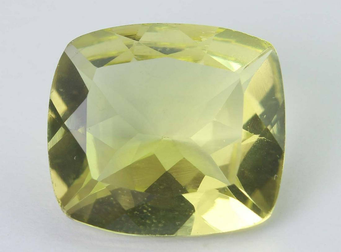 11.14 Ct Natural Lemon: No Reserve! Gemstone : Natural Lemon Origin: Brazil Weight : 11.14 carats Dimensions : 16.09x14.55x7.82 mm Shape/Cut : Retengular Cushan cut Colour: Yellow Transparency: transparent Clarity: VVS Treat