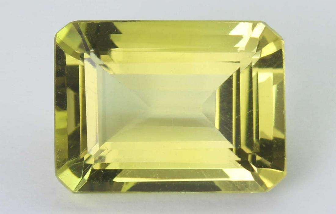 10.56 Ct Natural Lemon: No Reserve! Gemstone : Natural Lemon Origin : Brazil Weight : 10.56 carats Dimensions : 16x12 mm Shape/Cut : Retengular cut Colour: Yellow Transparency: transparent Clarity: VVS Treatment : none