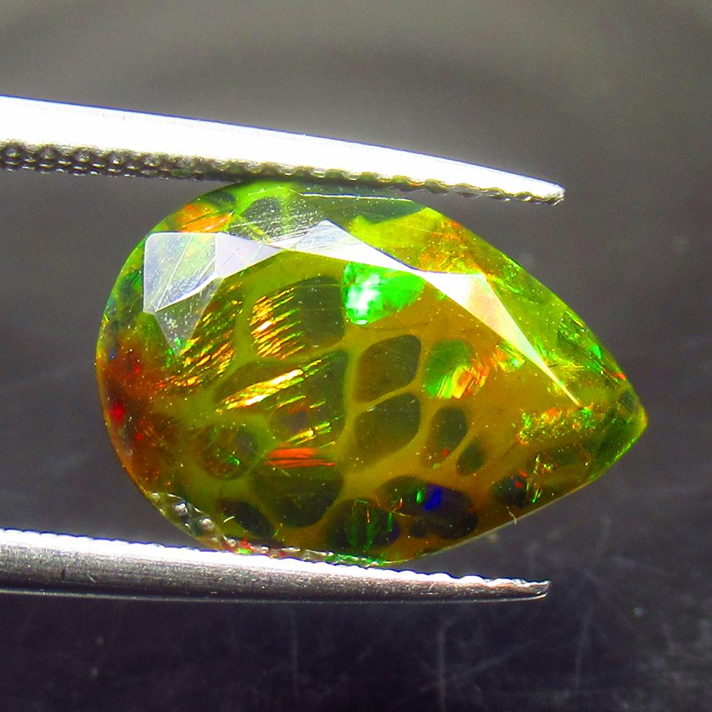 3.06 Ct Natural Ethiopian Black Fire Opal Pear Cut: No Reserve! Title: 3.06 Ct Natural Ethiopian Black Fire Opal Pear Cut Stone Clarity: Translucent Gemstones: Natural Black Opal Carat Weights: 3.06 Size/Dimensions: 14.20 x 10.10 x 5.50 mm Additional I