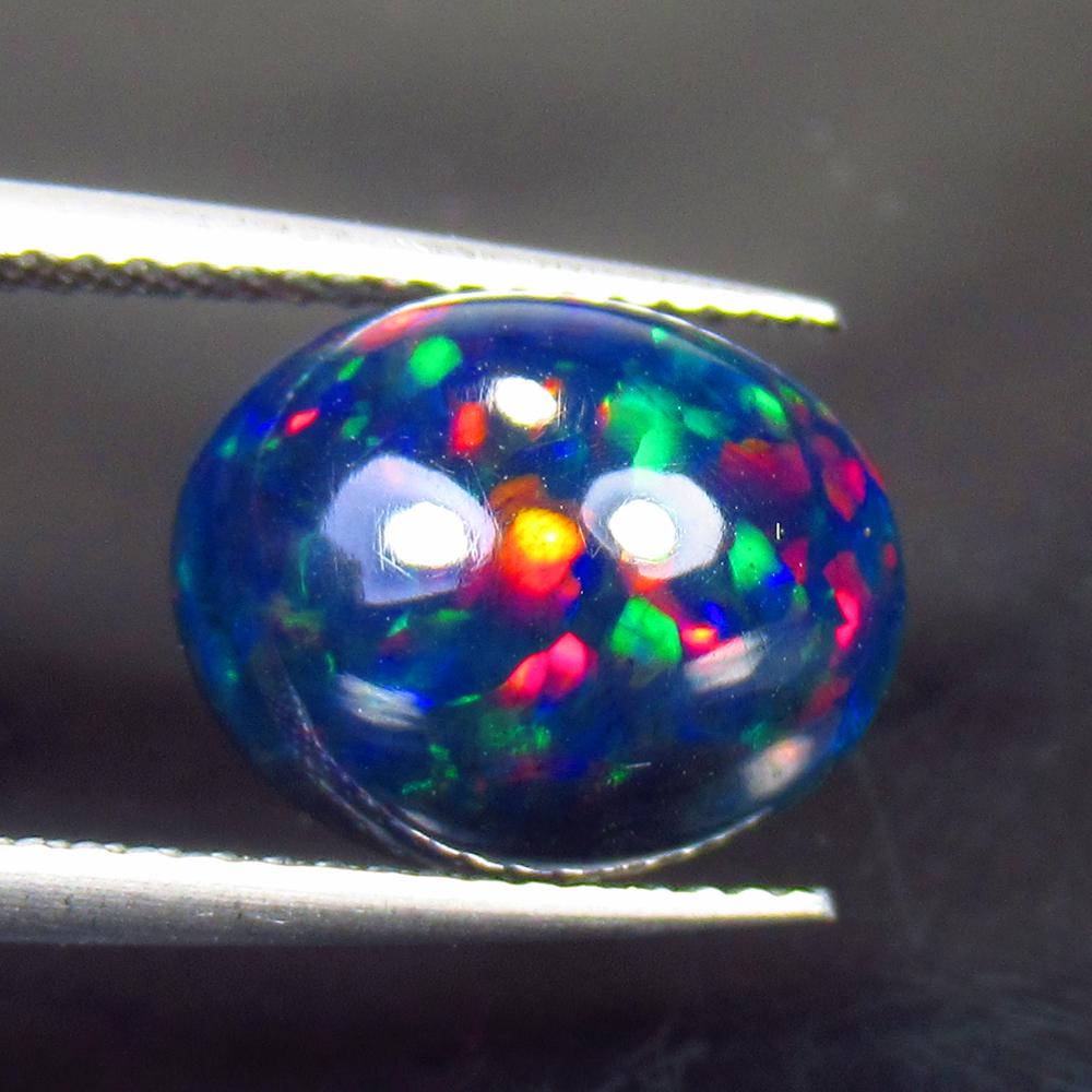 2.77 Ct Natural Ethiopian Black Fire Opal Oval Cab (1 of 3)