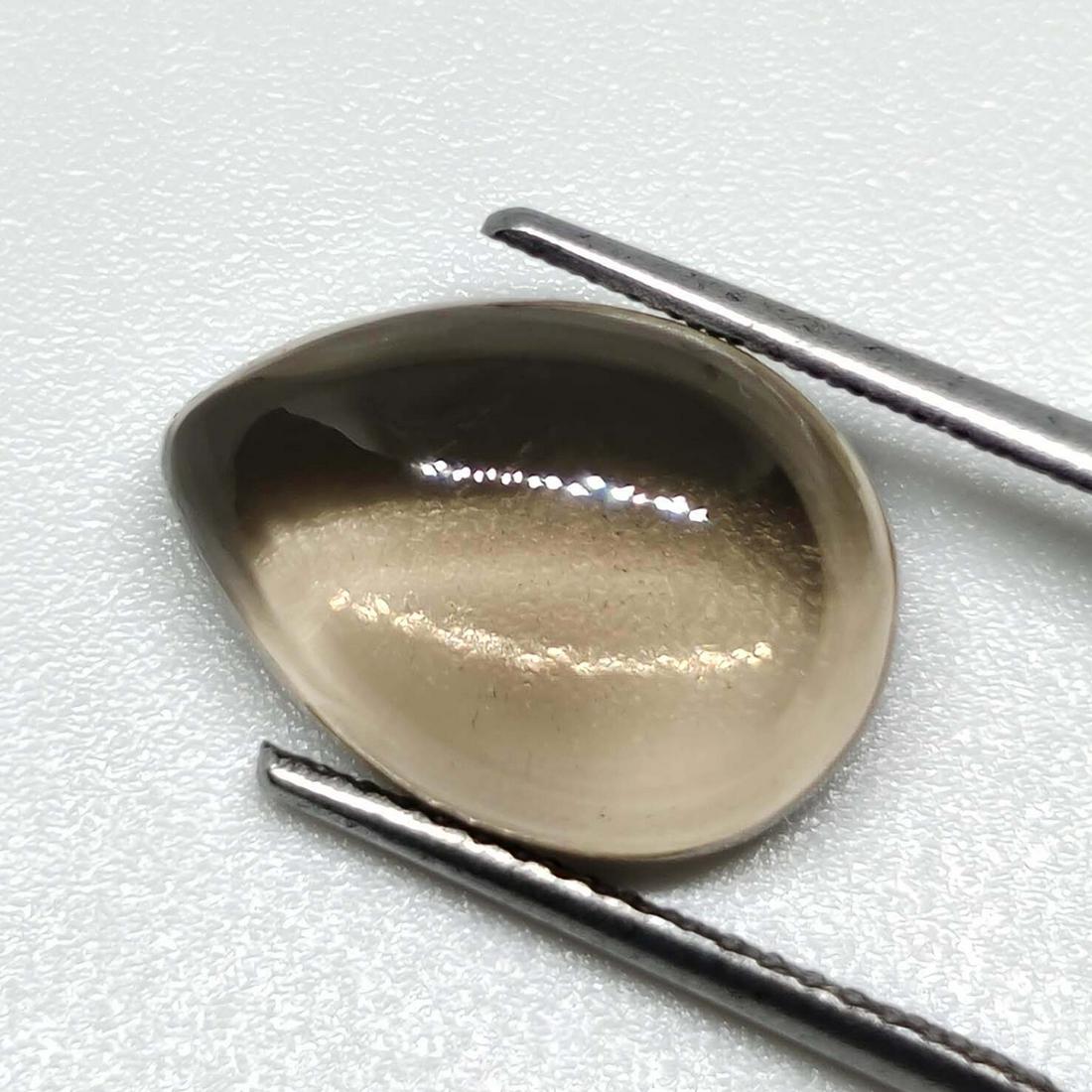 5.65 ct Natural Smoky Quartz: No Reserve! Title: 5.65 ct Natural Smoky Quartz Additional Information: Gemstones: Smoky Quartz Carat Weights: 5.35 ct Size/Dimensions: 14 x 10 x 5.3 mm Origin : Scotland Materials: Quartz Weight Unit