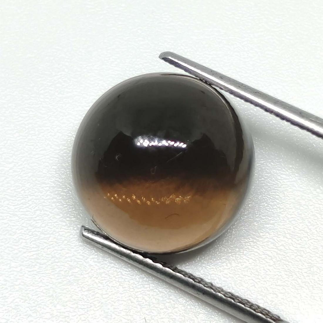 9.35 ct Natural Smoky Quartz: No Reserve! Title: 9.35 ct Natural Smoky Quartz Additional Information: Gemstones: Smoky Quartz Carat Weights: 9.35 ct Size/Dimensions: 13 x 13 x 7.3 mm Origin : Scotland Materials: Quartz Weight Unit