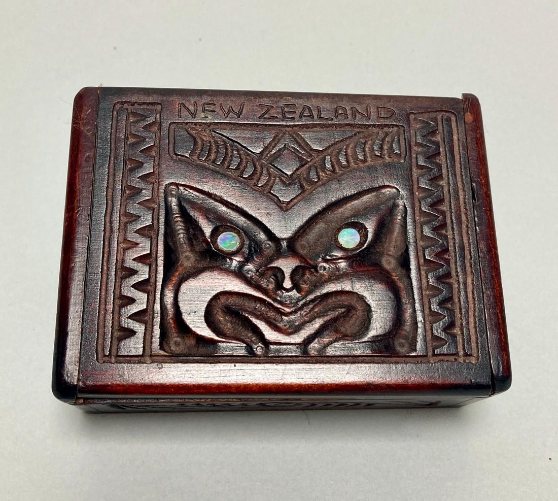 MAORI - Kapua Box mother of pearl abalone inlay: Title: MAORI - Kapua Box mother of pearl abalone inlay Additional Information: Great Kapua box, Maori, New Zealand. All hand carved with a figural face on the lid with pearl abalone eye inlays. Good c