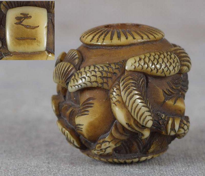 19c OJIME netsuke slide HUNTING FALCON by YUKIKAZU: 19th century ojime (slide bead for tightening the cord going from netsuke to inro) carved in medium relief with a falcon hunting a small bird among pine branches. Wonderful carving, excellent detailin