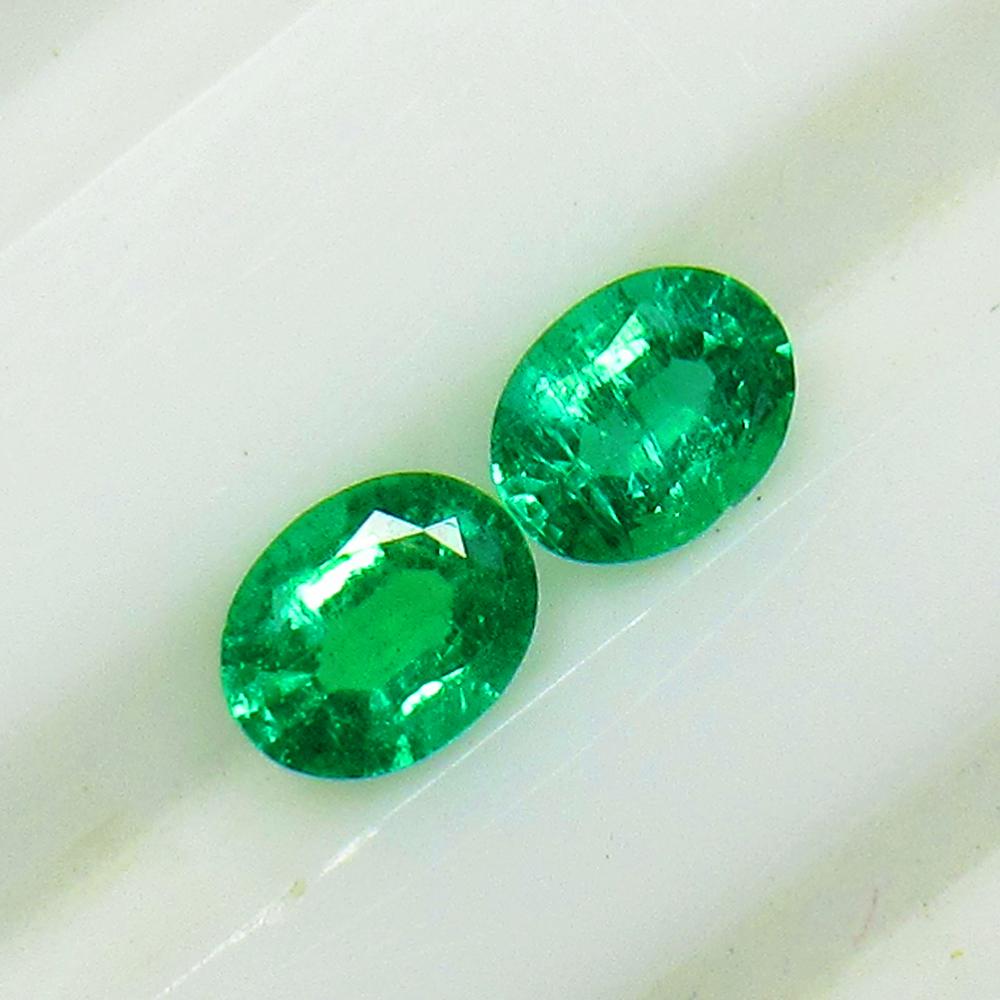 0.74 Ctw Natural Zambian Emerald Oval Pair: Title: 0.74 Ctw Natural Zambian Emerald Oval Pair Stone Clarity: VS-2 Gemstones: Emerald Carat Weights: 0.74 Size/Dimensions: 5.30 x 4.20 x 2.80 mm / 2 Pc's Additional Information: Very Good Luster / 