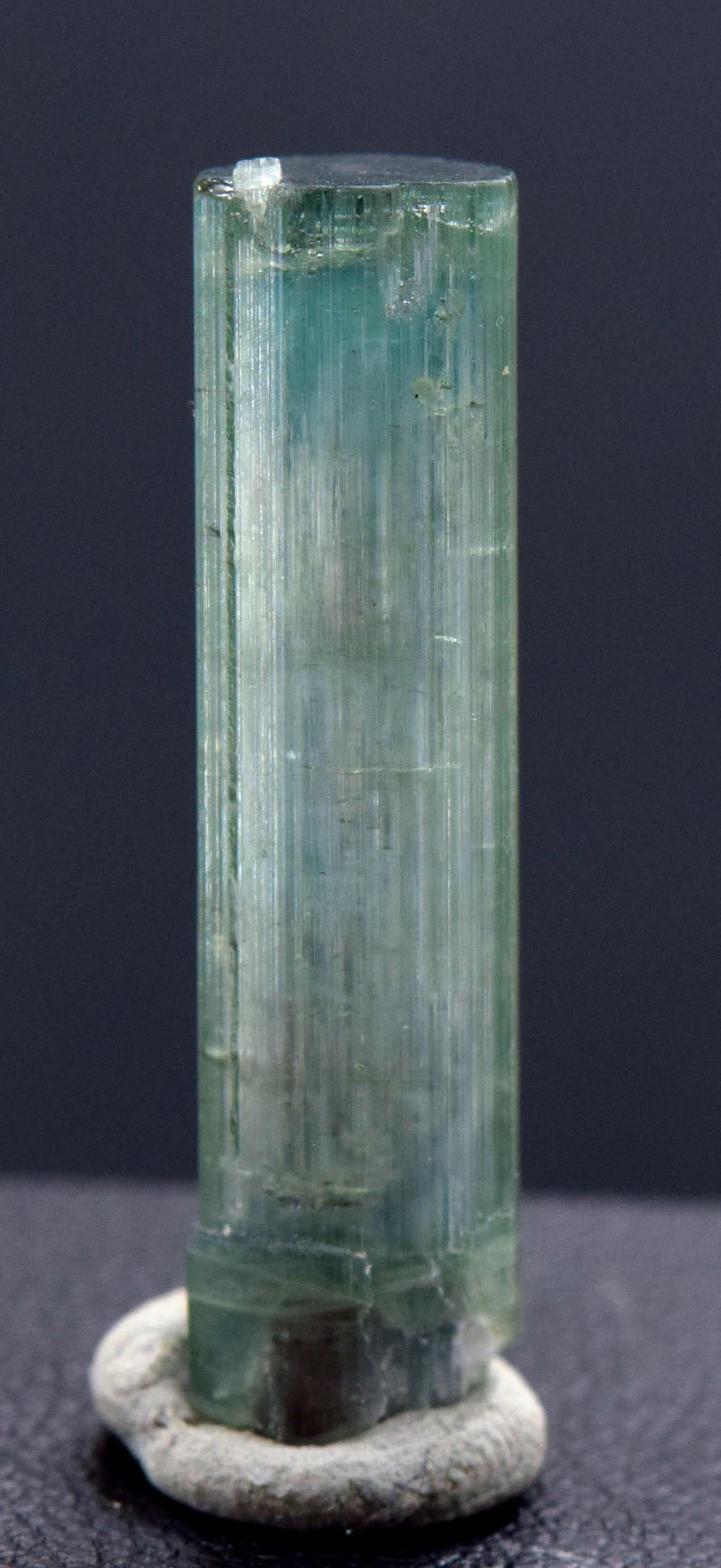 Tourmaline Crystal Terminated And Undamaged Cats Eye: Tourmaline Crystal , Terminated And Undamaged Paraiba Color Tourmaline Crystal From Afghanistan - Weight : 15.10 Carats Size : 30*7*7 mm Treatment : Natural Origin : Afghanistan Economy Shipping Reser