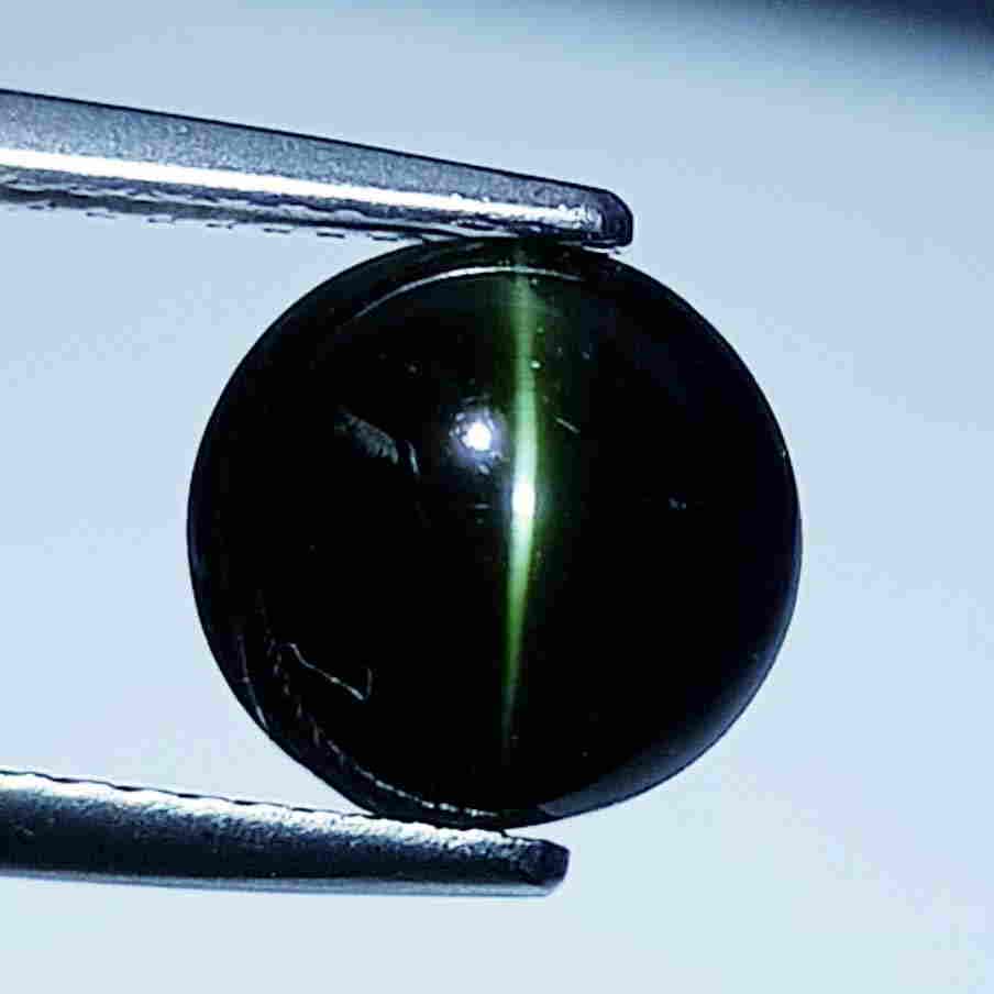 Natural Kornerupine Cat's Eye - 4.44 ct: No Reserve! Title: Natural Kornerupine Cat's Eye - 4.44 ct Color/Clarity: Opaque Loosegemstone Carat Weights: 4.44 Size/Dimensions: 8.80 x 8.50 x 6.60 Additional Information: Round - Madagascar Shippi