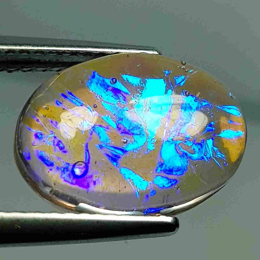 5.83 ct Australian Doublet Opal: No Reserve! Title: 5.83 ct Australian Doublet Opal Color/Clarity: Opaque Loosegemstone Carat Weights: 5.83 Size/Dimensions: 14.00 x 10.00 x 5.50 Additional Information: Oval - Australia Shipping: Dome