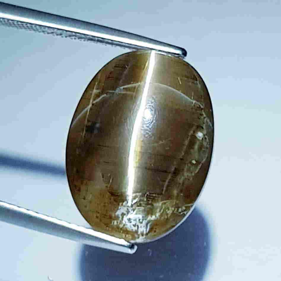 10.69 ct Natural Opal Cat's Eye: No Reserve! Title: 10.69 ct Natural Opal Cat's Eye Color/Clarity: Semi Transparent Loosegemstone Carat Weights: 10.69 Size/Dimensions: 17.50 x 13.50 x 8.50 Additional Information: Oval- Africa Shippin