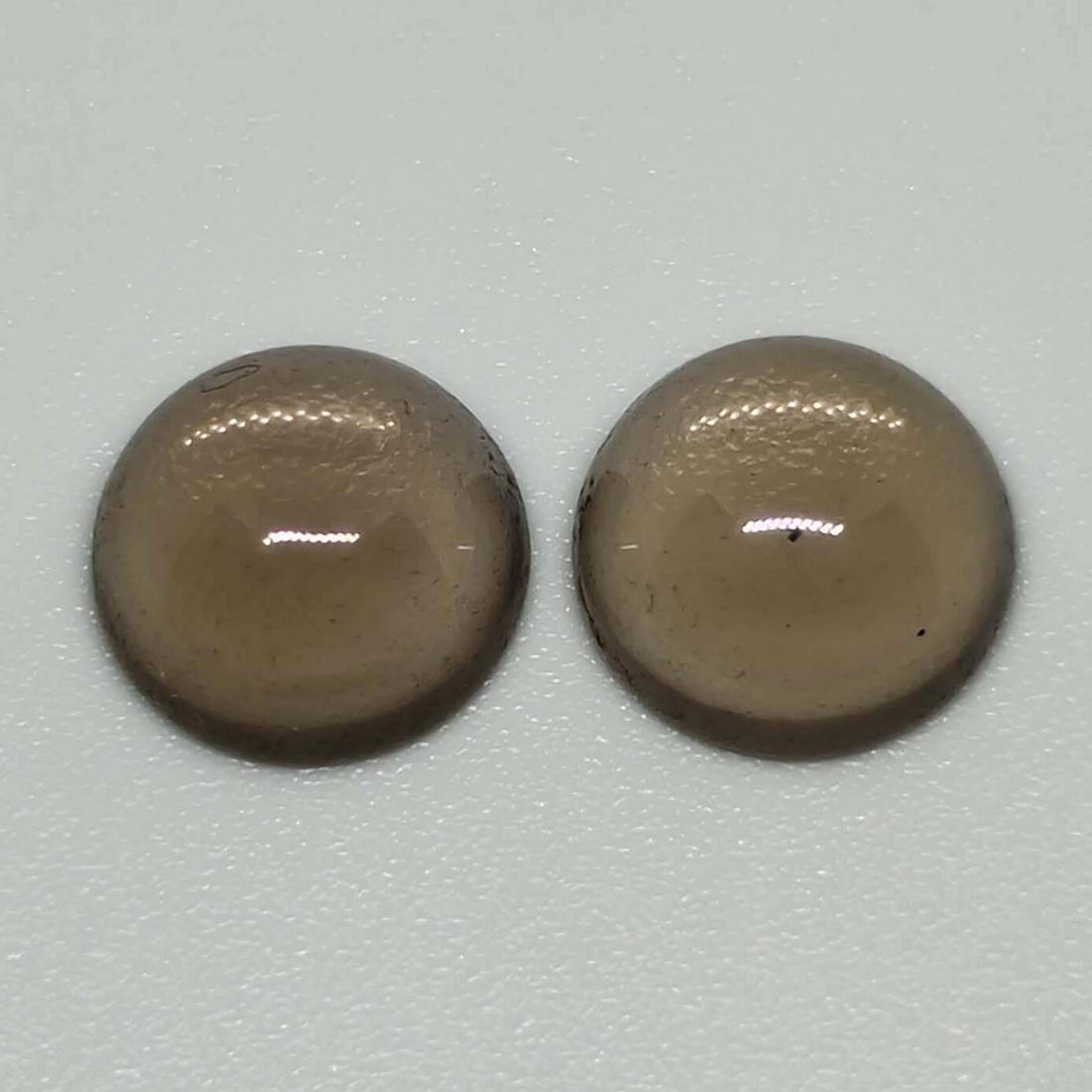 5.20 ct Natural Smoky Quartz Pair: No Reserve! Gemstones: Smoky Quartz Carat Weights: 5.20 ct Size/Dimensions: 9 x 9 x 4.55 mm Origin : Scotland Shipping: Domestic: Flat-rate of $7.00 to anywhere within the contiguous U.S. Internationa