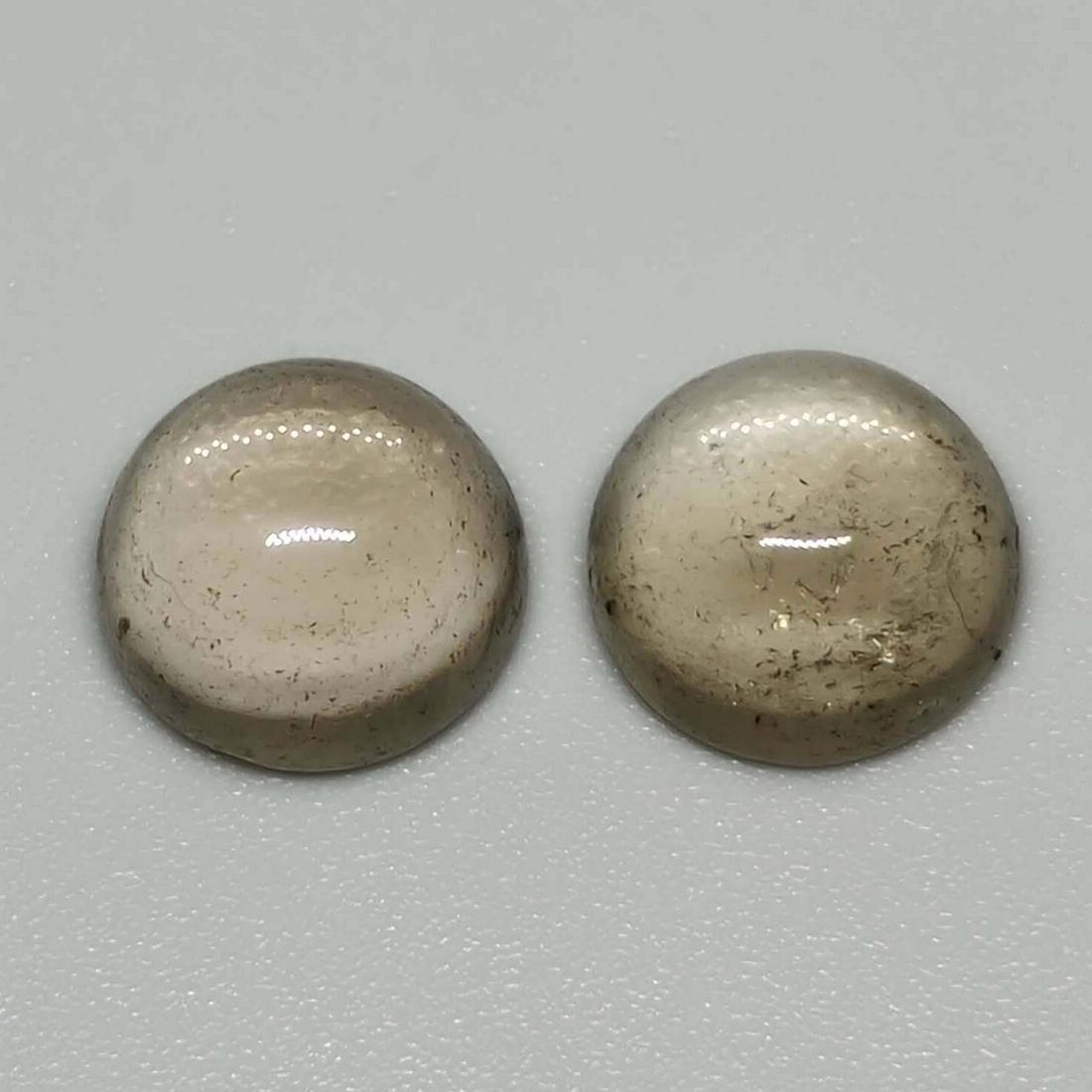 5.85 ct Natural Smoky Quartz Pair: No Reserve! Gemstones: Smoky Quartz Carat Weights: 5.85 ct Size/Dimensions: 9 x 9 x 5 mm Origin : Scotland Shipping: Domestic: Flat-rate of $7.00 to anywhere within the contiguous U.S. International: 