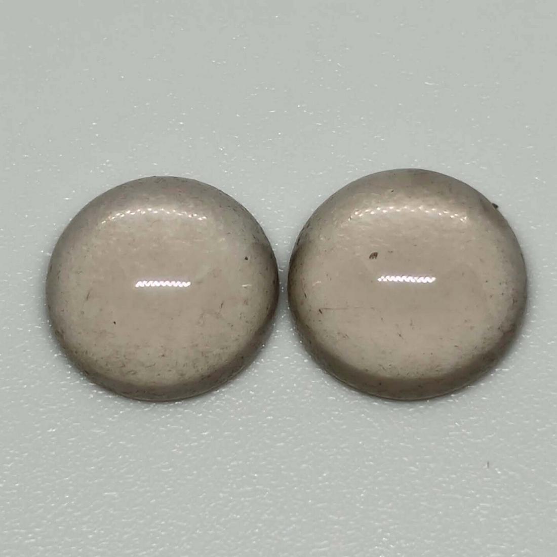 5.25 ct Natural Smoky Quartz Pair: No Reserve! Gemstones: Smoky Quartz Carat Weights: 5.25 ct Size/Dimensions: 9 x 9 x 4.5 mm Origin : Scotland Shipping: Domestic: Flat-rate of $7.00 to anywhere within the contiguous U.S. International