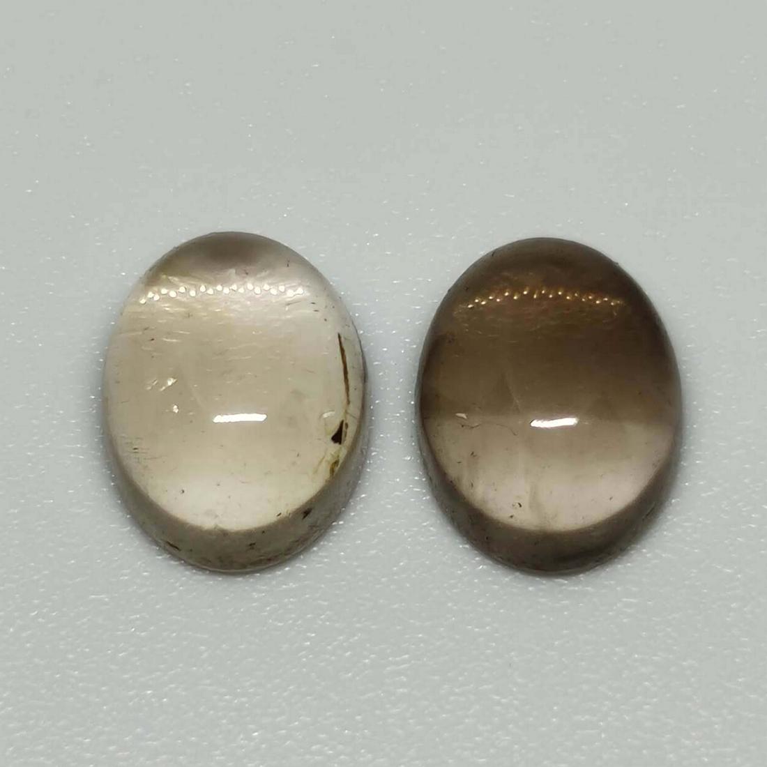 4.60 ct Natural Smoky Quartz Pair: No Reserve! Gemstones: Smoky Quartz Carat Weights: 4.60 ct Size/Dimensions: 9 x 7 x 4 mm Origin : Scotland Shipping: Domestic: Flat-rate of $7.00 to anywhere within the contiguous U.S. International: 