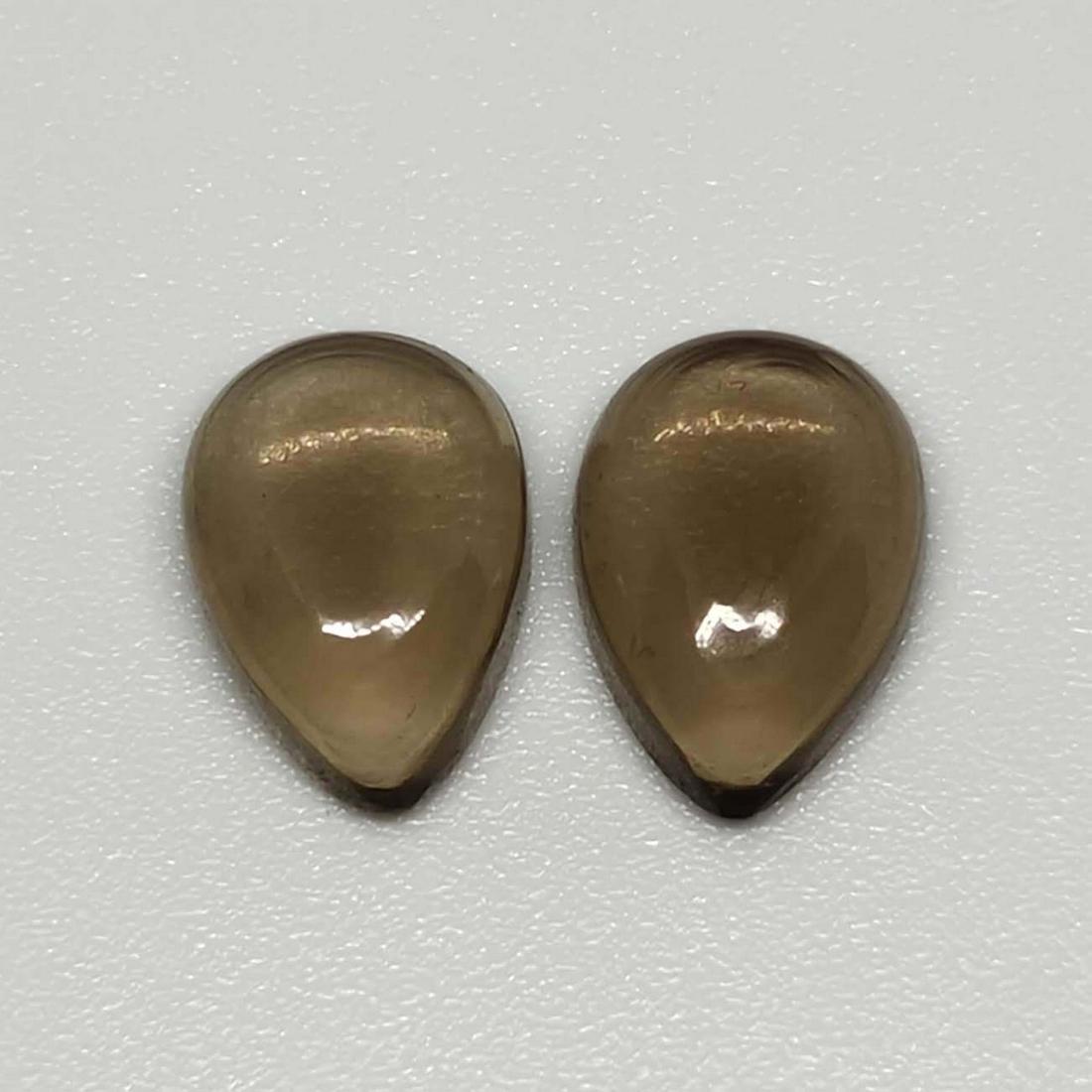4.20 ct Natural Smoky Quartz Pair: No Reserve! Gemstones: Smoky Quartz Carat Weights: 4.20 ct Size/Dimensions: 10 x 7 x 4 mm Origin : Scotland Shipping: Domestic: Flat-rate of $7.00 to anywhere within the contiguous U.S. International: