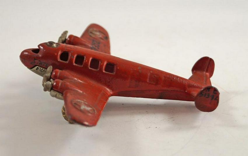 Antique Aircraft Airplane Cast Iron Hubley Toy: Title: Antique Aircraft Airplane Cast Iron Hubley Toy Date/Period: Circa 1930's-40's. Dimensions: 1 1/2" tall x 5 1/2" wide x 4 3/8" long. Provenance/Additional Info: Depicts a Airplane with twin engi