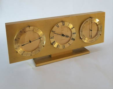 Mid Century Swiss Made Lancel Weather Clock Station: Title: Mid Century Swiss Made Lancel Weather Clock Station Maker: Lancel Origin: Switzerland Date/Period: 1978 Materials: Gilt brass Dimensions:10 x 4 x 2.5 inches Description: Art deco or modernist s