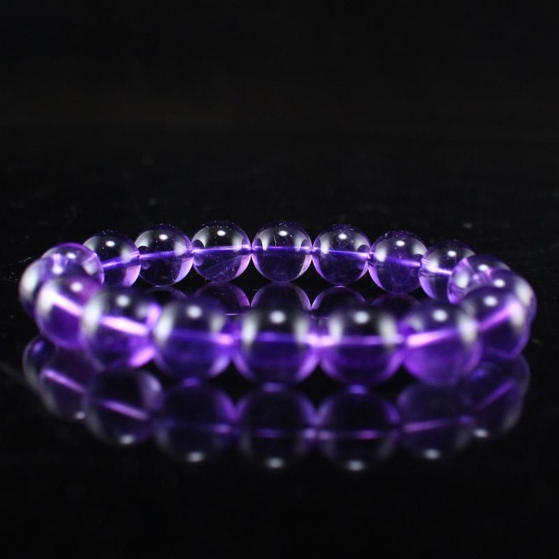 11 MM Natural Amethyst Beads Bracelet: Title: 11 MM Natural Amethyst Beads Bracelet Date/Period: After Materials: Amethyst Dimensions: Dimension: 11(mm) 0.43 (inches) Weight: 0.09 lbs/40 g The wooden stand no included. Reserve: $99.00 Ship
