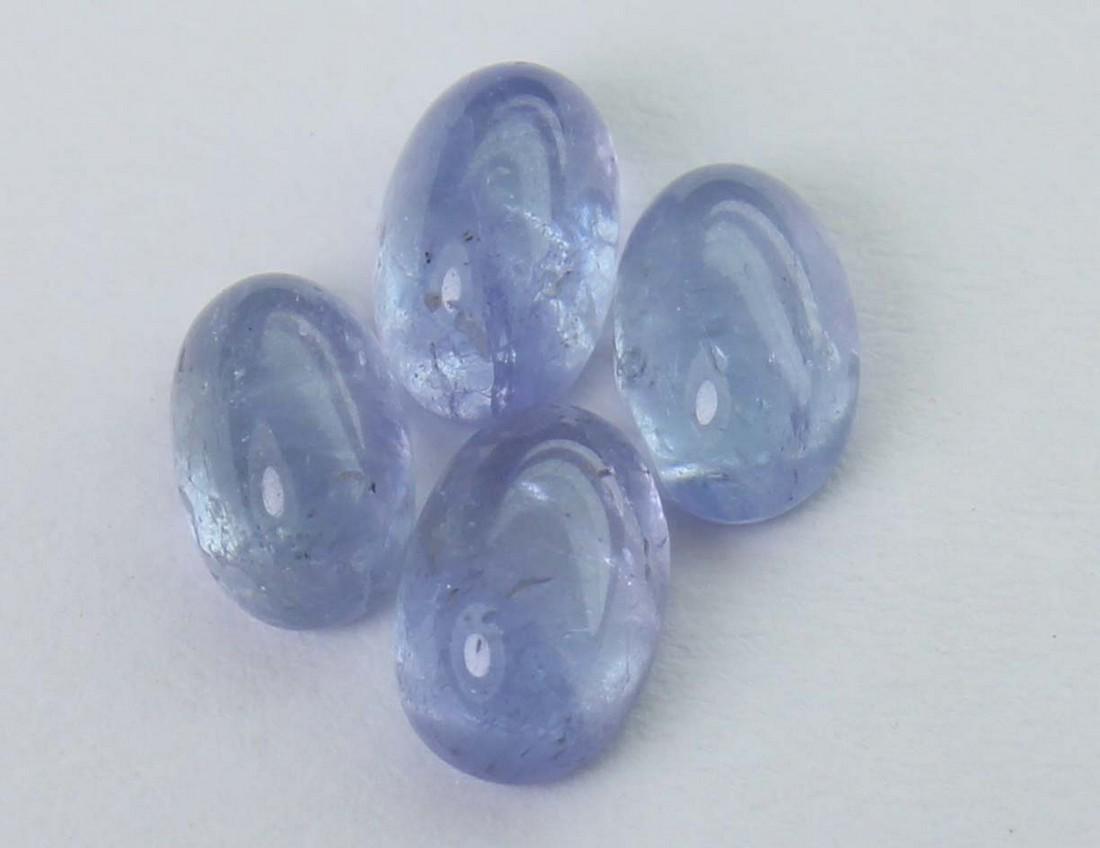 2.30 cts Natural Tanzanite Lot: No Reserve! Title: 2.30 cts Natural Tanzanite Lot Additional Info: Gemstone : Natural Tanzanite Shape and cut : Oval cabochan Weight : 2.30 Carats Measurements : 5.70x3.91x2.77 mm - 6.05x3.92x2.70 mm 