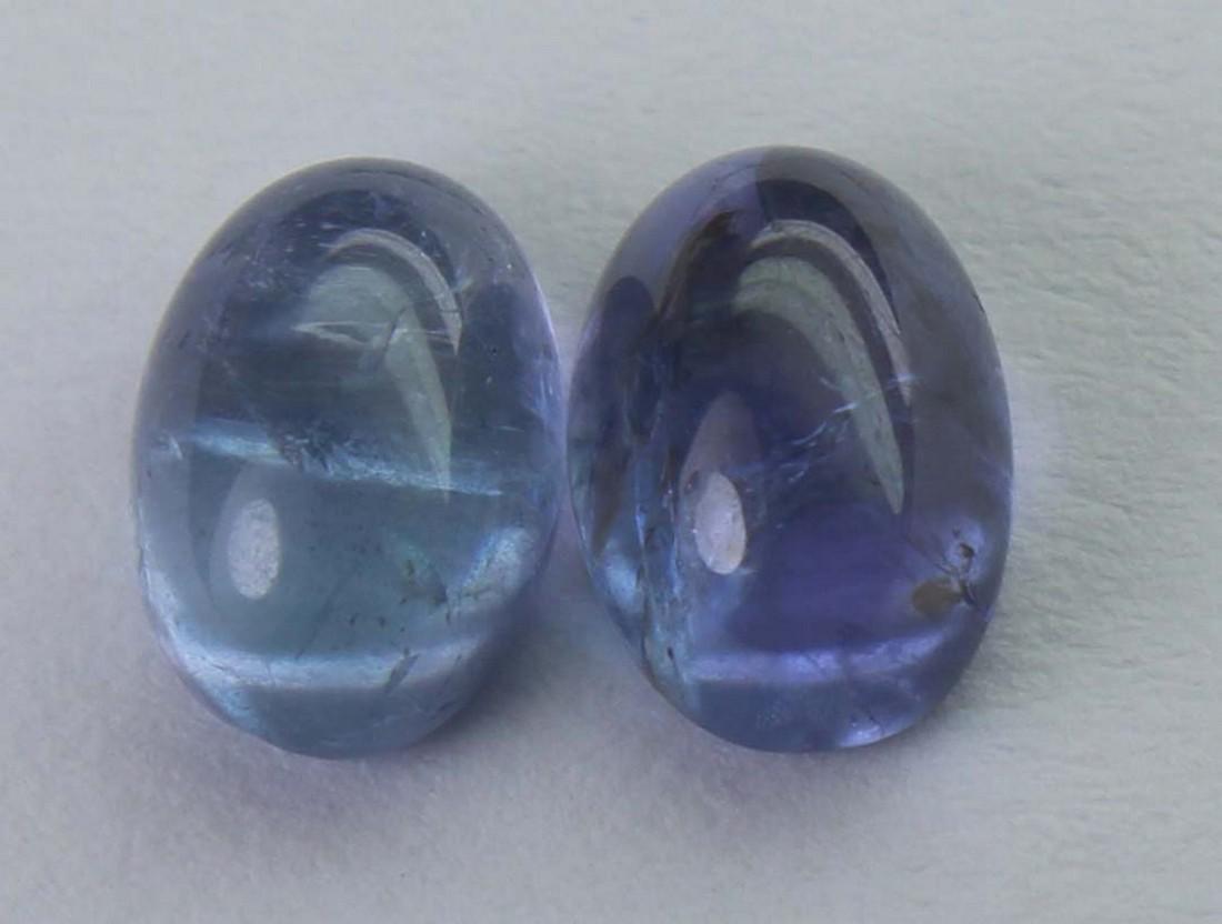 2.11 cts Natural Tanzanite Lot: No Reserve! Title: 2.11 cts Natural Tanzanite Lot Additional Info: Gemstone : Natural Tanzanite Shape and cut : Oval cabochan Weight : 2.11 Carats Measurements : 7x5 mm Number Of Stone : 2 Color : voi