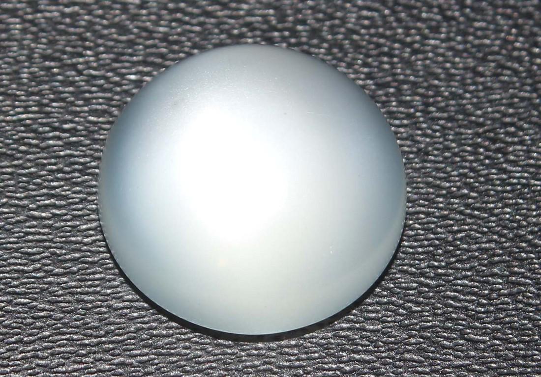6.29 Cts Natural Moonstone: No Reserve! Title: 6.29 Cts Natural Moonstone Additional Info: Gemstone : Natural Moonstone Shape : Round cabochan Weight : 6.29 Carats Measurements : 12x12 mm Color : White Transprancy : Translusent