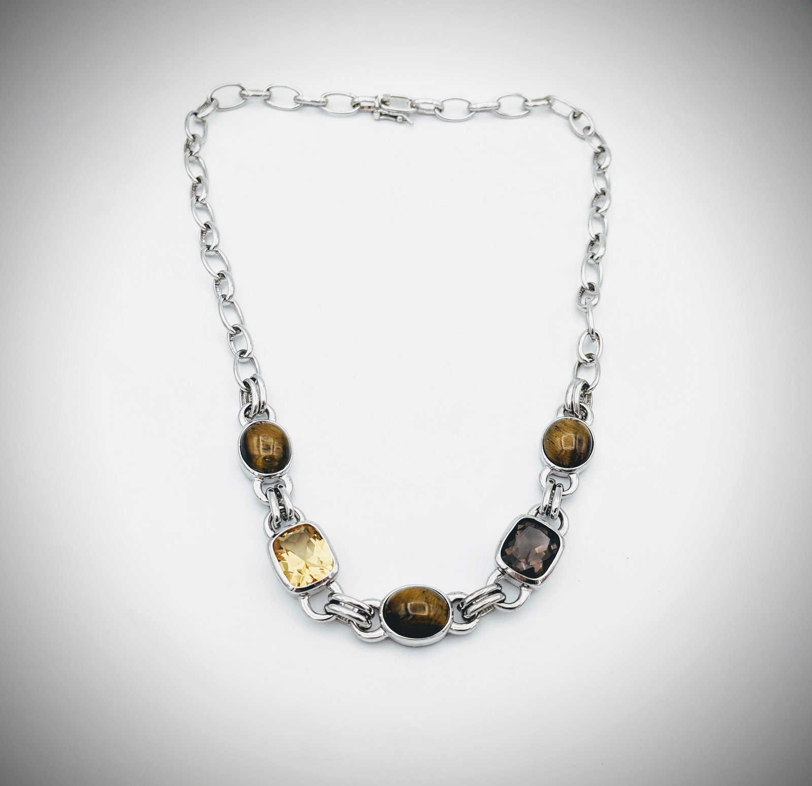 Sterling Silver Necklace w Tigers Eye, Smoky Quartz &: Brand: Jean Lin Collection Title: Sterling Silver Necklace w Tigers Eye, Smoky Quartz & Citrine Metal Purity: 925 Sterling Silver Gemstones: Tigers Eye, Smoky Quartz & Citrine Carat Weights: Necklace 
