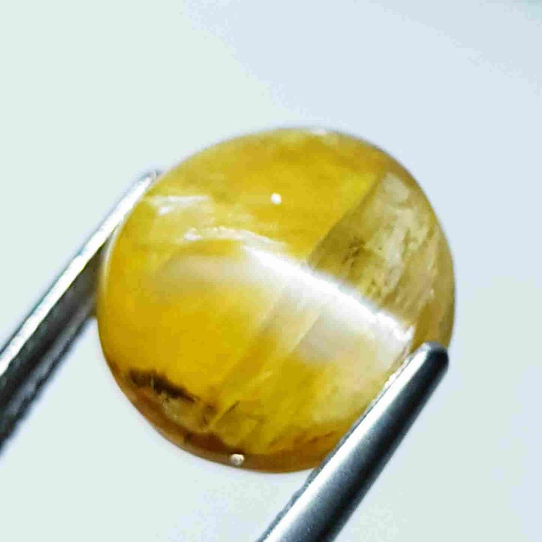 11.24 ct Natural Opal Cat's Eye: No Reserve! Title: 11.24 ct Natural Opal Cat's Eye Color/Clarity: Semi Transparent Carat Weight: 11.24 Size/Dimension: 14.80 x 14.80 x 10.50 Additional Information: Round - Africa Shipping: Domestic: